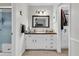 Bathroom with white vanity, shower, and walk-in closet at 211 Brailsford Rd, Summerville, SC 29485