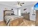 Comfortable main bedroom with a king-size bed and dresser at 211 Brailsford Rd, Summerville, SC 29485