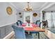 Elegant dining room with a large wood table and blue chairs at 211 Brailsford Rd, Summerville, SC 29485