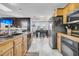 Spacious kitchen featuring wood cabinets, modern appliances, and a breakfast nook at 211 Brailsford Rd, Summerville, SC 29485