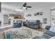 Open living room with hardwood floors and a ceiling fan at 211 Brailsford Rd, Summerville, SC 29485