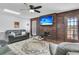 Living room features a wood accent wall and fireplace at 211 Brailsford Rd, Summerville, SC 29485