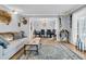 Open living room with a view into the dining room and access to the outdoors at 211 Brailsford Rd, Summerville, SC 29485