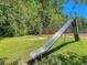 Community playground with slide and swings at 211 Brailsford Rd, Summerville, SC 29485