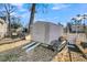 White storage shed with ramp and stairs at 211 Brailsford Rd, Summerville, SC 29485