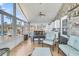 Sunroom with kitchen bar, seating, and beautiful water views at 211 Brailsford Rd, Summerville, SC 29485