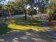 Golf course with palm trees and walking paths at 219 Sea Cloud Cir, Edisto Island, SC 29438