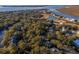 Aerial view of waterfront community with golf course and lush landscaping at 219 Sea Cloud Cir, Edisto Island, SC 29438