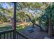 Backyard with picnic table and lush landscaping at 219 Sea Cloud Cir, Edisto Island, SC 29438