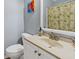 Clean bathroom with white vanity and shower/tub combo at 219 Sea Cloud Cir, Edisto Island, SC 29438