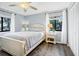Main bedroom with white bed frame and wood floors at 219 Sea Cloud Cir, Edisto Island, SC 29438