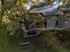 Two-story home nestled amongst mature trees at 219 Sea Cloud Cir, Edisto Island, SC 29438
