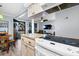 Open concept kitchen with view into living room at 219 Sea Cloud Cir, Edisto Island, SC 29438