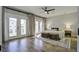 Main bedroom with hardwood floors and French doors leading to a balcony at 2270 Tillage St, Mount Pleasant, SC 29466