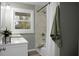 Updated bathroom features a soaking tub, walk-in shower, and modern vanity at 2334 Falcon Rd, North Charleston, SC 29406