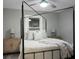 Bright bedroom with a canopy bed and built in shelving at 2334 Falcon Rd, North Charleston, SC 29406