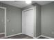 Bright bedroom with double door closet and wood-look flooring at 2334 Falcon Rd, North Charleston, SC 29406