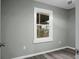 Simple bedroom with large window and wood-look flooring at 2334 Falcon Rd, North Charleston, SC 29406