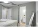 Main bedroom with ensuite bathroom access and a full length mirror at 2334 Falcon Rd, North Charleston, SC 29406