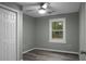 Spacious bedroom with ceiling fan, large closet and wood-look flooring at 2334 Falcon Rd, North Charleston, SC 29406
