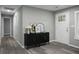 Modern entryway with a sleek console table and hardwood floors at 2334 Falcon Rd, North Charleston, SC 29406