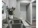 Modern farmhouse sink with a sleek faucet and granite countertops at 2334 Falcon Rd, North Charleston, SC 29406
