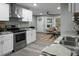 Modern kitchen features stainless steel appliances and granite countertops at 2334 Falcon Rd, North Charleston, SC 29406