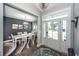 Bright dining room with white table and chairs at 2427 Jasper Patterson Dr, Johns Island, SC 29455