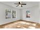 Bright bedroom with hardwood floors and large windows at 2720 W Surrey Dr, North Charleston, SC 29405