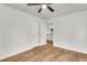 Simple bedroom with hardwood floors and access to kitchen at 2720 W Surrey Dr, North Charleston, SC 29405