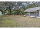 Large backyard with mature trees and a shed at 2736 Bonds Ave, North Charleston, SC 29405