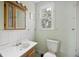 Simple bathroom with single sink vanity and toilet at 2736 Bonds Ave, North Charleston, SC 29405