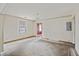 Empty dining room with worn carpet and chandelier at 2736 Bonds Ave, North Charleston, SC 29405