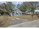 House exterior with gray siding and a small front yard at 2736 Bonds Ave, North Charleston, SC 29405