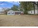 Gray sided ranch home with brick accents and mature trees at 2736 Bonds Ave, North Charleston, SC 29405