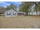 Ranch style home with gray siding, brick accents, and a spacious yard at 2736 Bonds Ave, North Charleston, SC 29405