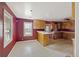 Bright kitchen features wood cabinets and vinyl flooring at 2736 Bonds Ave, North Charleston, SC 29405