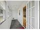 Enclosed porch with multiple windows and a door at 2736 Bonds Ave, North Charleston, SC 29405