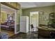 Eat-in kitchen with a round table and chairs, plus view of living room at 303 Holly Avenue Ave, Goose Creek, SC 29445