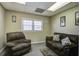 Relaxing living room with two brown couches and a rug at 303 Holly Avenue Ave, Goose Creek, SC 29445