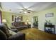 Living room with hardwood floors and view to dining area at 303 Holly Avenue Ave, Goose Creek, SC 29445
