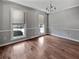 Bright dining room featuring hardwood floors and large windows at 309 Mayfield St, Summerville, SC 29485