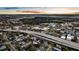 A high quality shot of the home's surrounding urban area, including an interstate and industrial zones at 33 Cypress St, Charleston, SC 29403