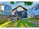 Large backyard with deck, grass, and surrounding homes at 33 Cypress St, Charleston, SC 29403