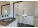 Modern bathroom with black sink and glass shower at 33 Cypress St, Charleston, SC 29403