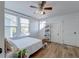 Bedroom with a queen bed, ceiling fan, and built-in shelving at 33 Cypress St, Charleston, SC 29403