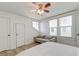 Bright bedroom with wood floors, large windows, and a comfortable sitting area at 33 Cypress St, Charleston, SC 29403
