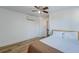 Bedroom with a queen bed, ceiling fan, and mini-split AC unit at 33 Cypress St, Charleston, SC 29403