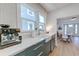 Stylish kitchen boasts a farmhouse sink and espresso machine at 33 Cypress St, Charleston, SC 29403