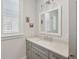 Modern bathroom with gray vanity and quartz countertop at 375 Huger St # B, Charleston, SC 29403